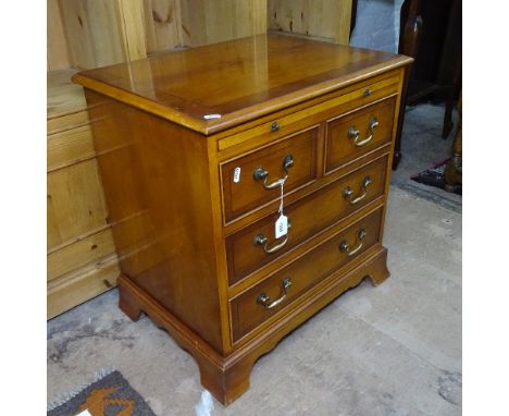 A small reproduction yew wood chest, with brushing slide, 2 short and 2 long drawers, on bracket feet, W60cm, H62cm, D44cm 