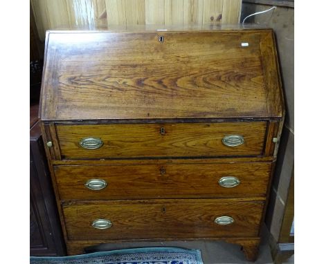 A Georgian elm bureau, with a part satinwood fitted interior, 3 long graduated drawers under, bracket feet, W89cm, H105cm, D4