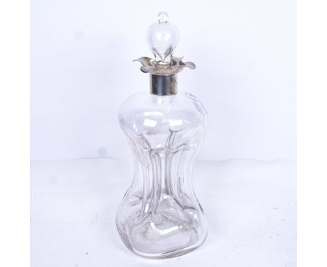 A large glass decanter and stopper of waisted form, with silver collar, height 31cm 