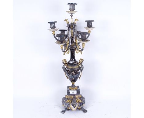 A modern Empire style 7-light table candelabra, simulated marble urn with allover silvered and gilded decoration, height 62cm