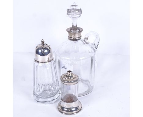 A glass decanter with silver collar, a sugar sifter with silver lid, and another (3) 