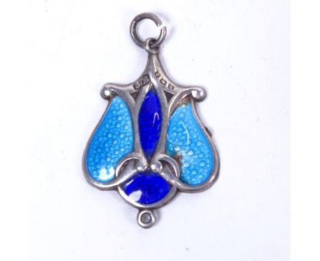 An Art Nouveau silver and coloured blue enamel pendant of stylised design, width 2cm 