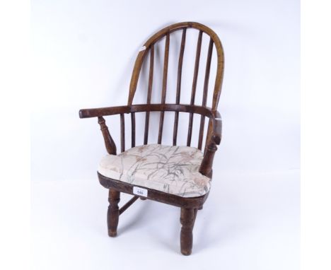 A 19th century child's elm seat stick-back Windsor chair, height 57cm 