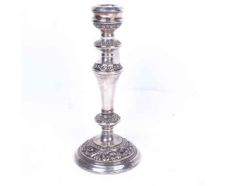 An embossed silver single candlestick, Birmingham 1975, height 22.5cm 