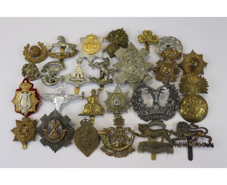 A Collection Of 25 British Military Badges To Include The First Volunteer Battalion Of The Royal Fusiliers, The Royal Scots, 