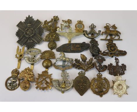 A Collection Of 25 British Military Badges To Include The Royal Electrical And Mechanical Engineers, The Special Air Service,