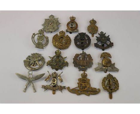 A Collection Of 15 British Military Cap Badges To Include The Queens Own Yorkshire Yeomanry, The Cornish Light Infantry, The 