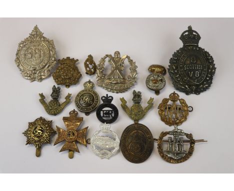 A Collection Of 15 British Military Cap Badges To Include The Loyal North Lancashire Regiment, The Royal Air Force, The Dorse