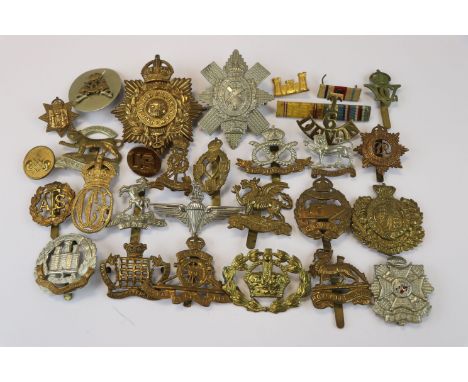 A Collection Of 25 British Military Badges To Include The Tank Corps, The Border Regiment, The Northamptonshire Regiment, The