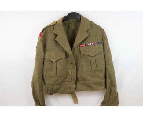 A British Army Battle Dress Uniform Complete With Cloth Badges To The Royal Engineers And Medal Bar With Oak Leaf, Dated 1949