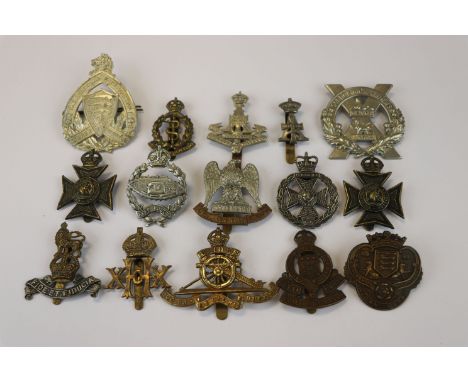 A Collection Of 15 British Military Cap Badges To Include The Royal Scots Greys, The Royal Artillery Regiment, The Tank Regim
