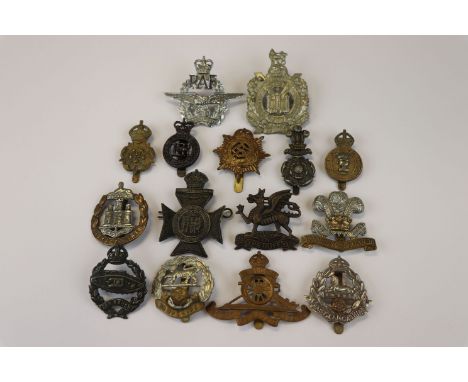 A Collection Of 15 British Military Cap Badges To Include The Army Catering Corps, The Dorsetshire Regiment,  The Hampshire R