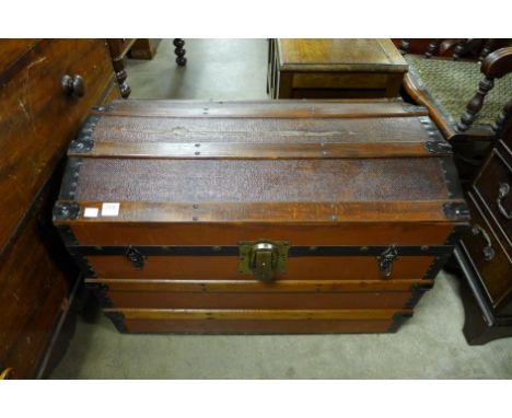 A dome top steamer trunk