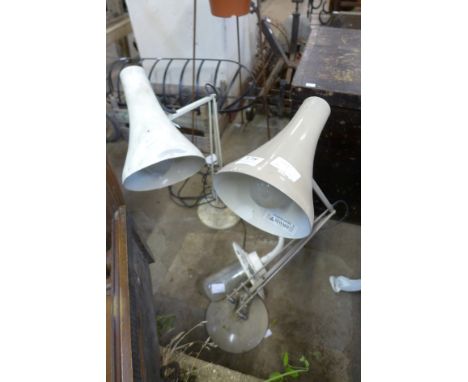 Two anglepoise lamps and an industrial wall light