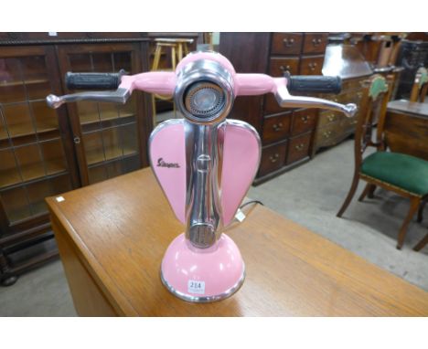 A pink Vespa table lamp