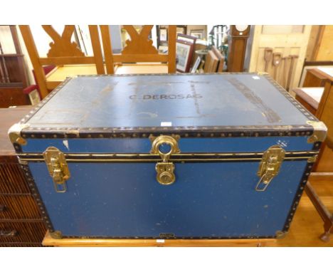 A blue steamer trunk