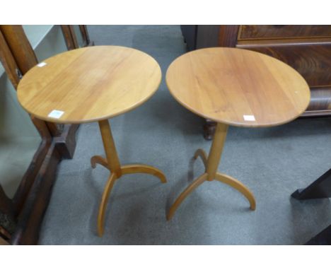 A pair of sycamore tripod tables