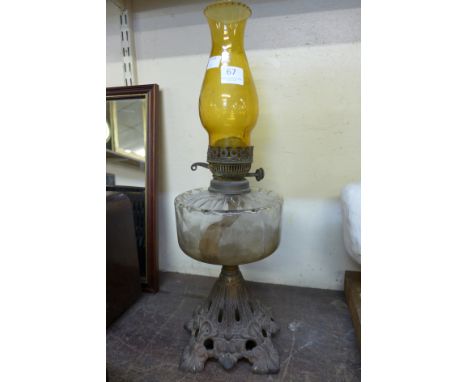 A Victorian cast iron oil lamp