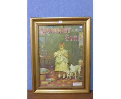 A reproduction Sunlight Soap advertising print, framed