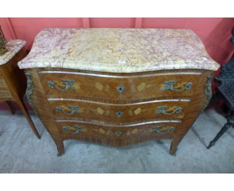 A French Louis XV style inlaid kingwood and ormolu mounted commode, with serpentine marble top