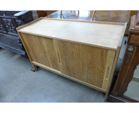 A Cotswold School light oak fitted sideboard
