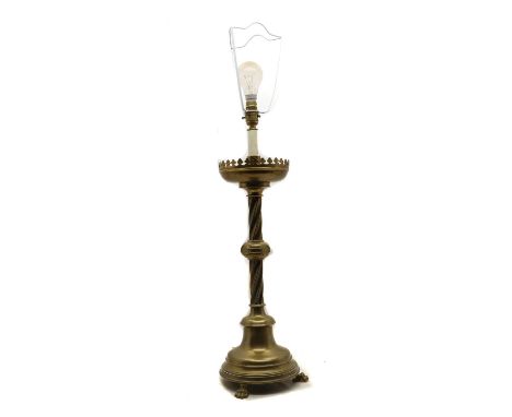 A brass candlestick table lamp,20th century, ecclesiastical style, on spiral twist column and dome base,62cm highCondition re