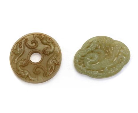 Two Chinese jade carvings, 20th century, comprising: one of bi disc, of circular form with a central aperture, surrounded chi