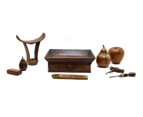 A group of Treen items, 20th century, to include a jar in the form of a pear, 13cm high, the stalk that unscrews to reveal a 