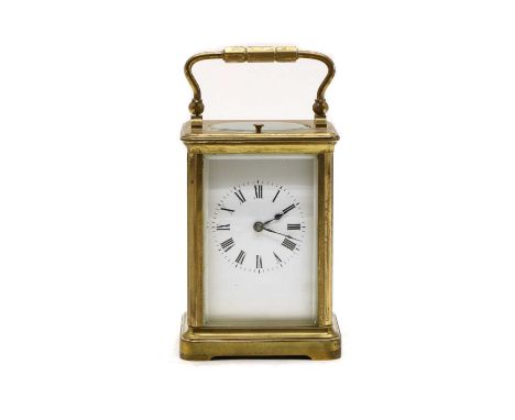 A brass repeater carriage clock, early 20th century, white enamel Roman dial in four bevel glass case, the movement striking 
