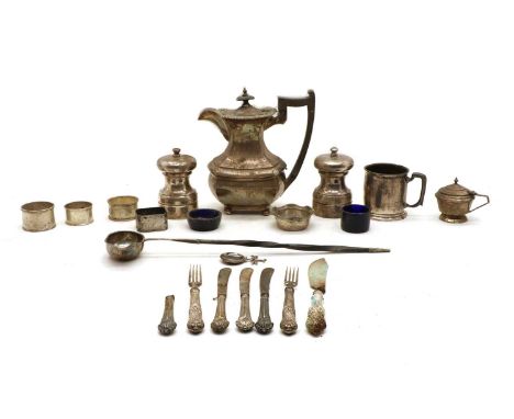 A collection of silver items, to include a hot water jug, by Walker and Hall, Sheffield 1919, a toddy ladle with inlaid Georg