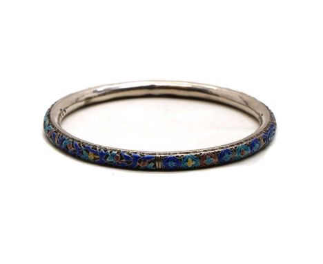 A Chinese silver enamelled bangle, c.1900, decorated with foliage and leaves, stamp marked 'WH' and '800',internal diameter 7