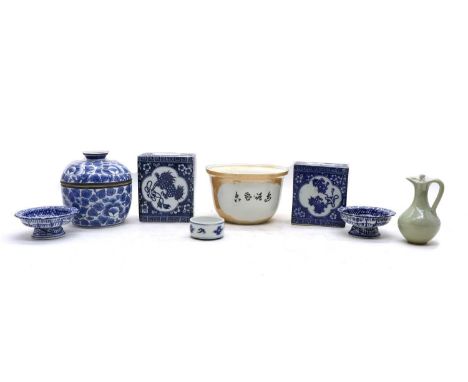 A collection of Chinese porcelain covers, 18th-20th century, comprising: one blue and white, of oval form, painted with peoni