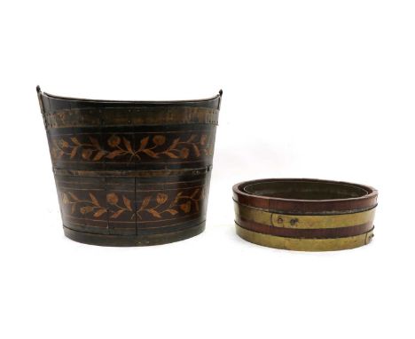 A coopered and marquetry bucket,19th century, of oval form, with brass and copper mounts, a swing handle, with a metal liner,