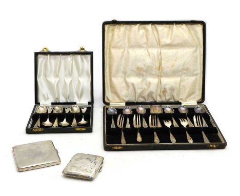 A cased set of six silver teaspoons, by Susan M Whitehead, Birmingham 1977, the terminals with pierced swallow motif, togethe