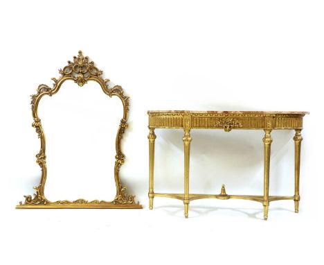 A gilt console table and mirror, the cartouche shaped plate with moulded c scroll frame, above rouge marble top and fluted fr