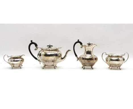 An Edwardian silver four piece tea service,by John Round &amp; Son Ltd, Sheffield 1909 and 1910, comprising a teapot, 17.5cm 