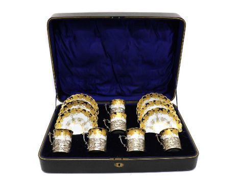 A cased set of Aynsley coffee cups and saucers, 20th century, fitted pierced silver cup holders, Sheffield 1909, the cups, an