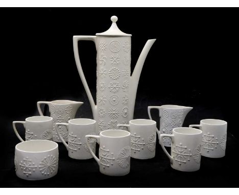 A Portmeirion pottery 'Totem' coffee service,designed by Susan Williams-Ellis, white glazed with relief moulded decoration, p