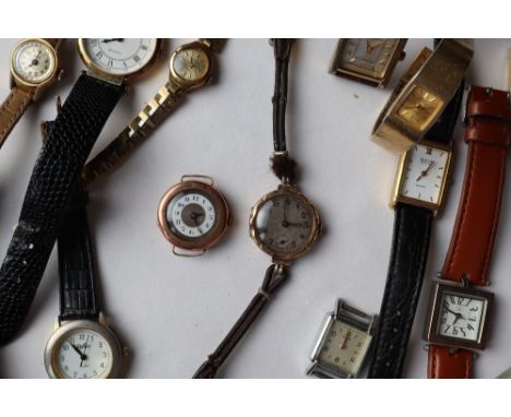A Lady's 9ct yellow gold wristwatch, with a white enamel dial ring together with another 9ct gold wristwatch and a collection
