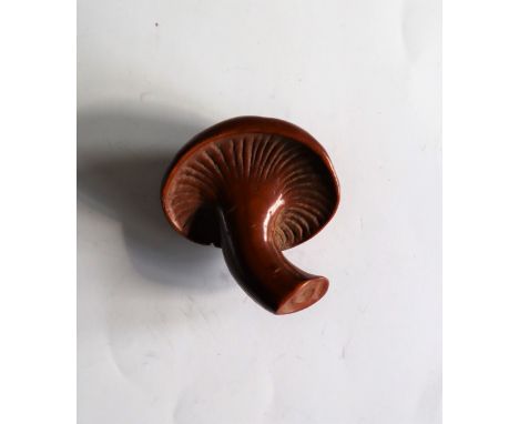 A 19th century Japanese carved wooden netsuke of a mushroom, 40mm high 