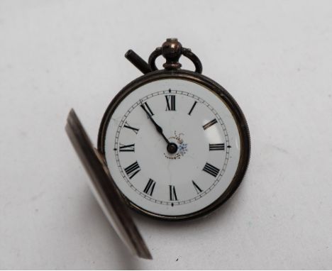 A late Victorian silver fob watch, the white enamel dial with Roman numerals, Birmingham, 1887