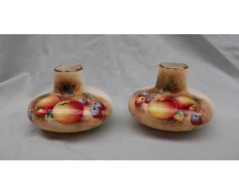 A pair of Royal Worcester bone china vases, of squat form painted with apples and cherries, signed Roberts, black printed mar
