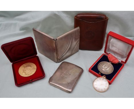 Two silver cigarette cases together with a 9ct gold Lanco pocket watch, with a cream dial and batons, a gilt metal medallion 