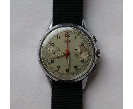 A Gentleman's mid size Hugex chronometer the silvered dial with Arabic numerals, and two subsidiary dials, red stopwatch hand