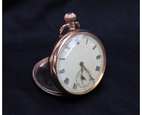 A 9ct yellow gold keyless wound open faced pocket watch, the enamel dial with Roman numerals and a seconds subsidiary dial, 5