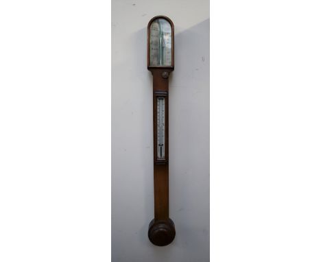 A Negretti &amp; Zambra oak cased stick barometer, with a domed top and removable mercury thermometer with a circular reservo