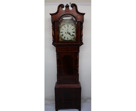 A 19th century mahogany longcase clock, the hood with a broken swan neck pediment and turned pillars above a short trunk door