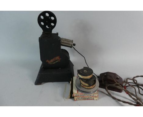 A Vintage Bingoscope Movie Projector Complete with Six Pathescope 8mm Films 