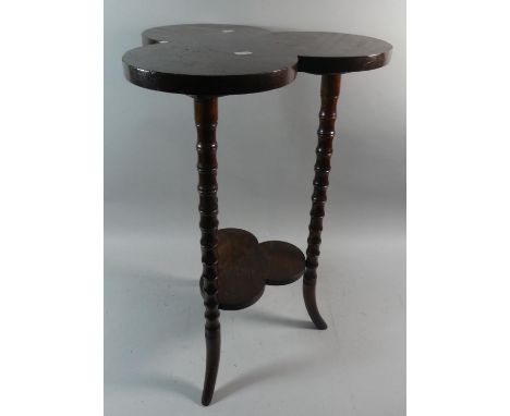 A Mahogany Clover Leaf Side Table on Bobbin Supports, 65cm high 