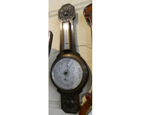 An Edwardian Oak Framed Wheel Barometer with Temperature Scale by J H Campbell &amp; Co., Liverpool, 61cm High 